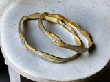 Designer golden bangles