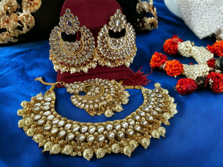 Kundan necklace set with earrings and tikka